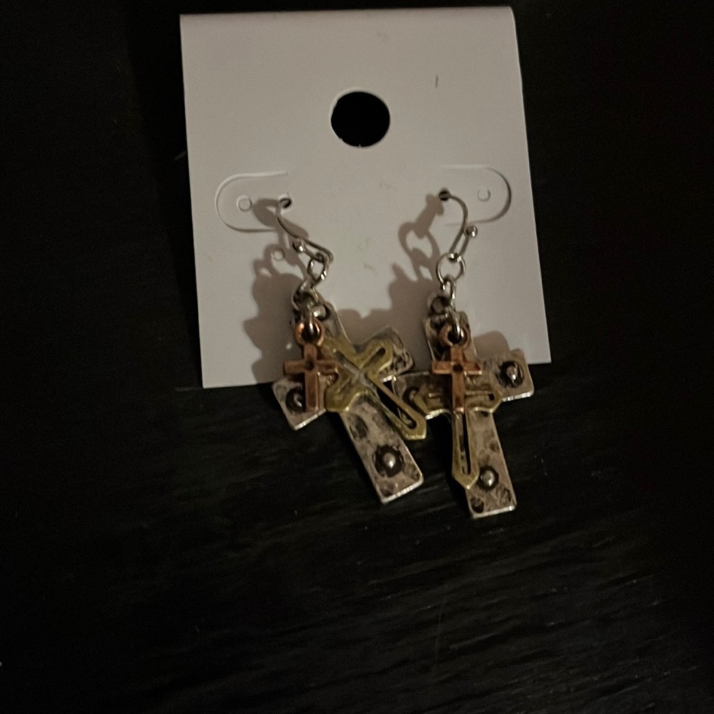 Cross earrings in new condition